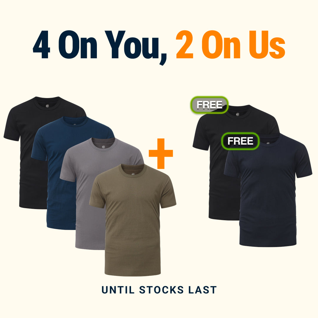 Stack of folded MBB t-shirts in multiple colours